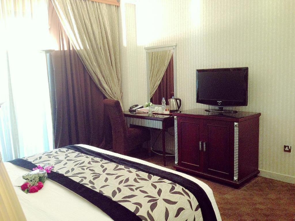 Abjad Grand Hotel Dubai Quarto foto